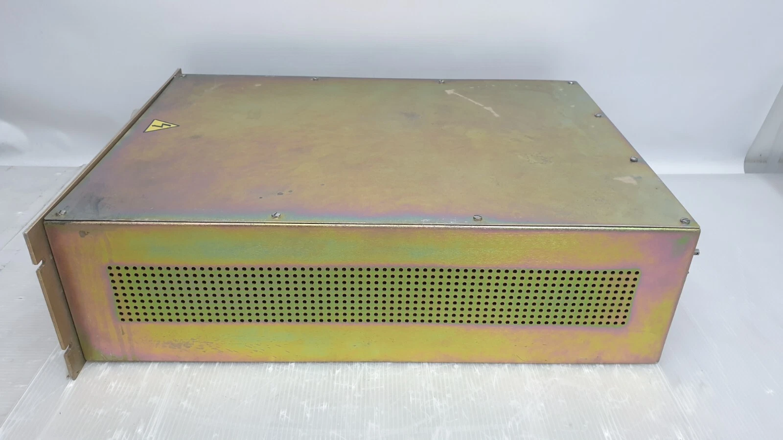 Side of the MKS ASTeX SA86281 chassis with ventilation perforations
