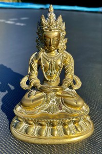 An important 18th century Qianlong period Chinese Gilt bronze Buddha
