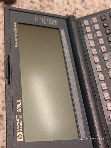 Hewlett Packard HP 200LX 4MB RAM PDA Palmtop PC w power adapter floppies cables - Photo 17 sur 24