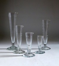 5 Graduated Vintage Lab Chemist Apothocary Glass Measuring Jugs. Engraved