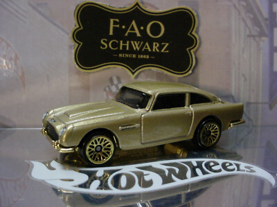 2022 FAO SCHWARZ Design Exclusive ASTON MARTIN 1963 DBS gold  LOOSE Hot Wheels