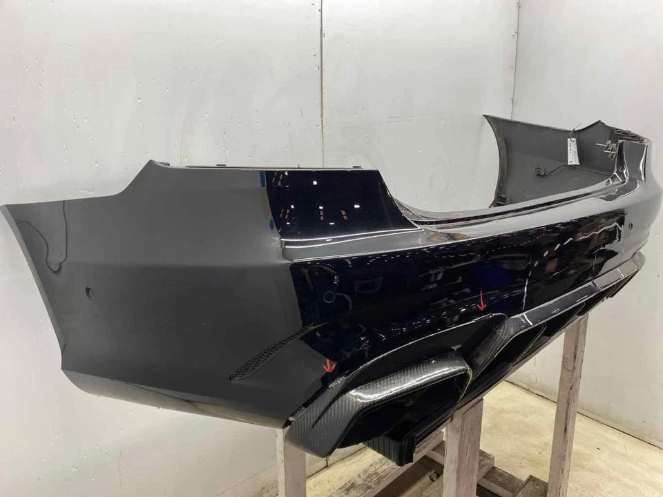 2014 - 2016 MERCEDES E63 AMG OEM REAR BUMPER COVER | BLACK (040) + CARBON FIBER - Image 2 of 4