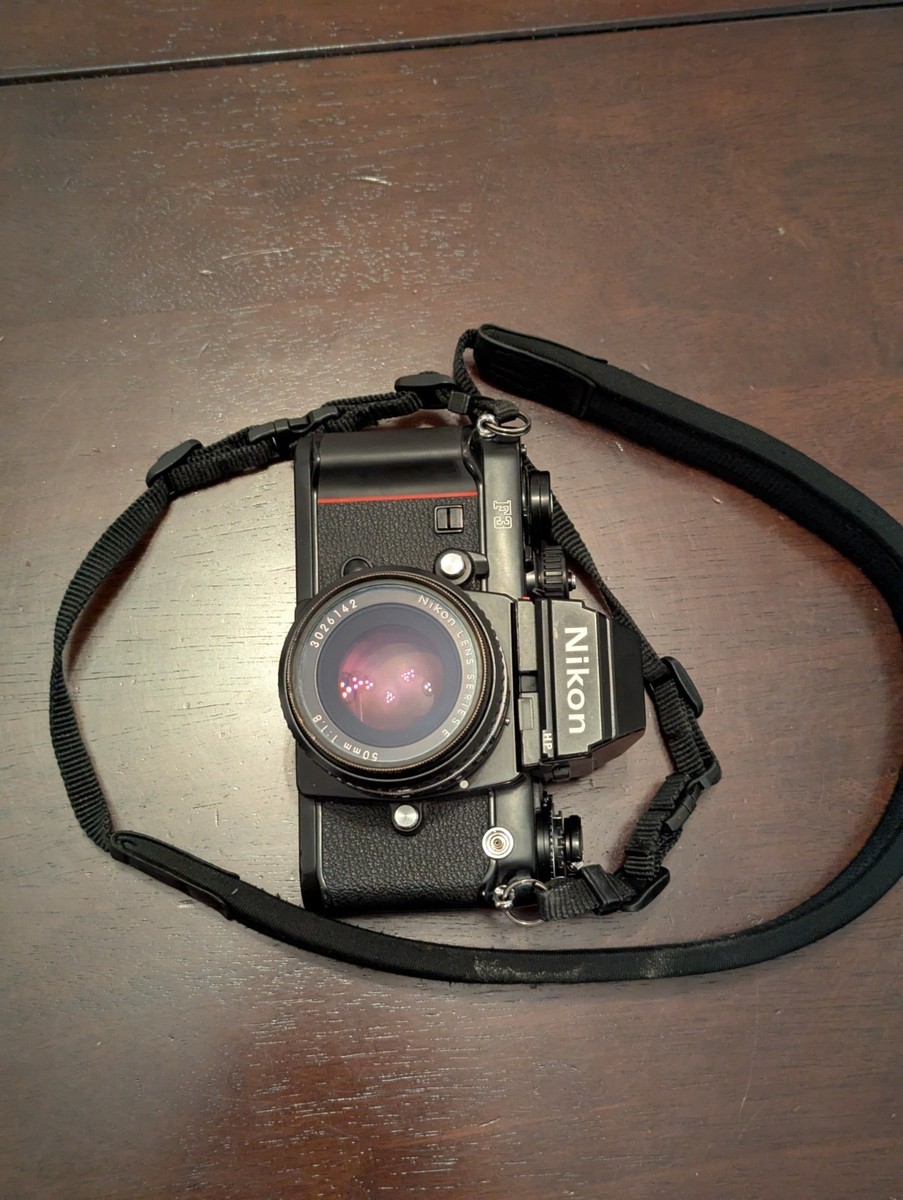 Nikon F3 HP Camera with Strap Hood and 50mm F1.8 Ai-s Lens Black