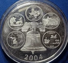 A 2004 Highland Mint Giant 50 States Commemorative  - 4 Ounces Silver COA