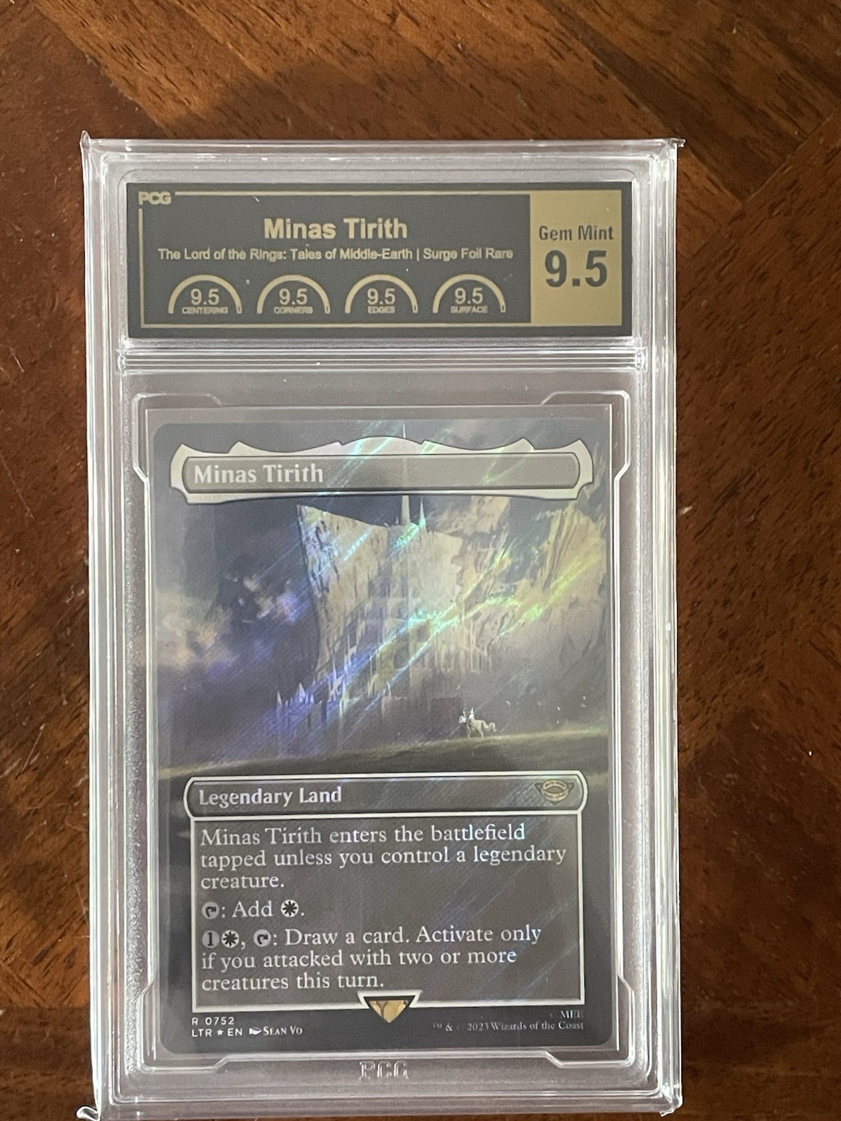 2023 MTG THE LORD OF THE RINGS MINAS TIRITH (SURGE FOIL) PCG 9.5 / Cross PSA 10