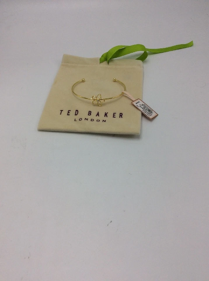 Brazalete fino Ted Baker tono dorado flor de cristal TB9 $45 Foto 2 de 4