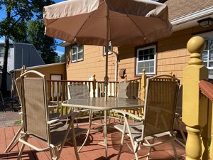 outdoor patio 6 chair dining set with an Umbrella