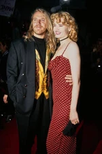 Finnish film director Renny Harlin wearing a black suit over a bla- Old Photo 2