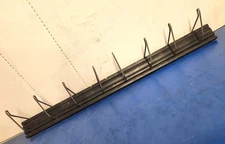 ONE VINTAGE MODAC FAN BELT WALL DISPLAY RACK WITH 8 HOOKS