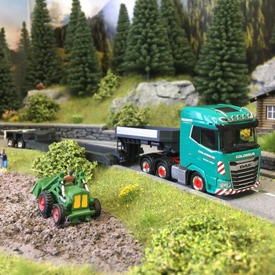 Tieflader Sattelzug, DAF XG, 6x2, Colossus Logistic - Herpa 319553 -