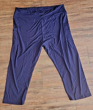 Set Of 3 Capri Leggings marked curvy size Navy with pockets ,black, and floral