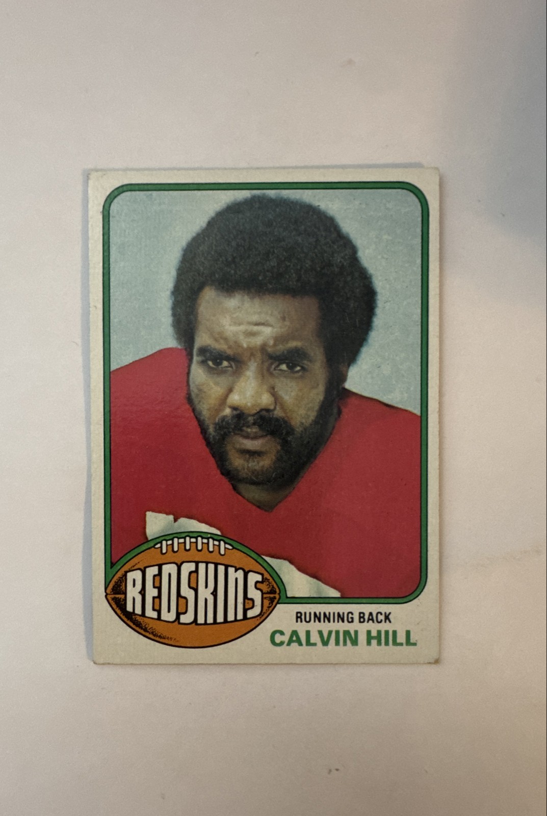 Calvin Hill #131 (Football Cards 1976 Topps) — is it worth grading?