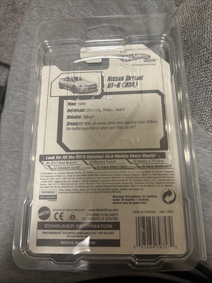 Blister abollado Hot Wheels Nissan Skyline GT-R (R34) 2010 nuevos modelos #7/44 D84 Foto 2 de 4