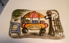 NEW ORLEANS CRESENT CITY HOT DOG STREET VENDOR POTTERY PLAQUE 7 1/2" X 5"