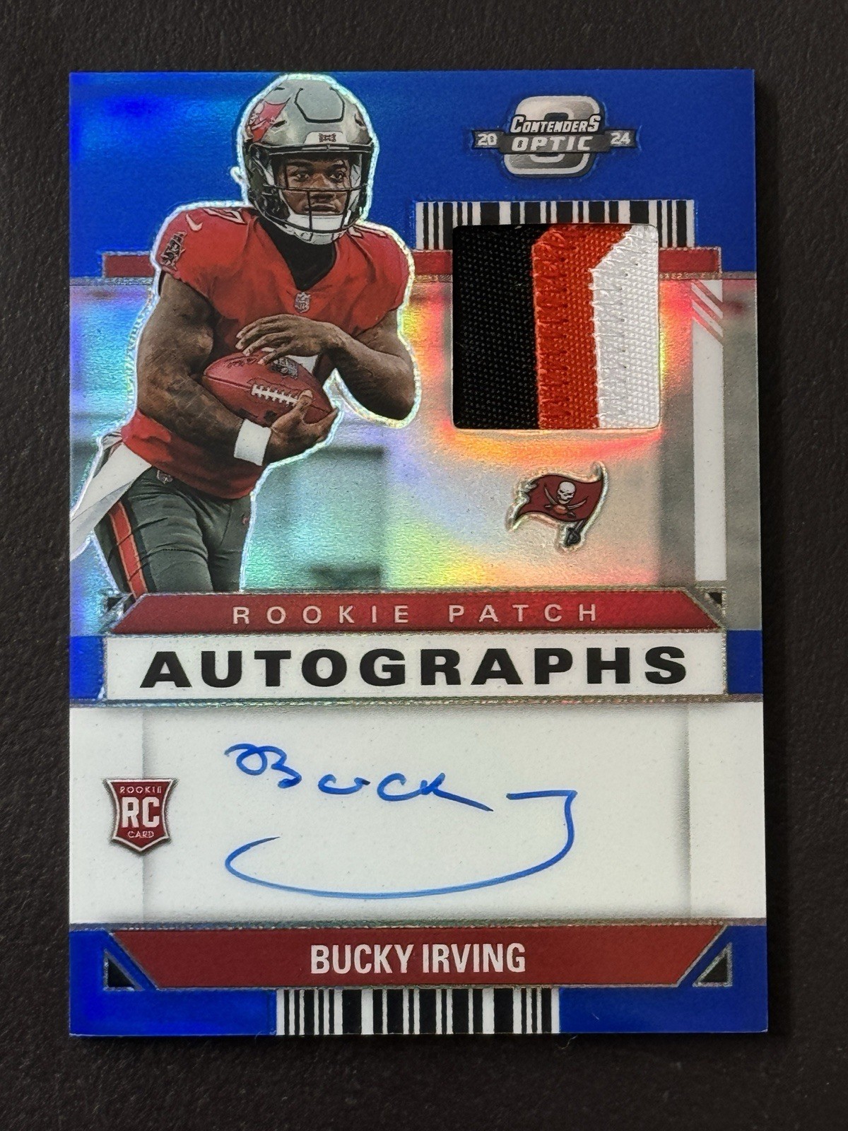 2024 Contenders Optic Bucky Irving #RPA-BIG Rookie Patch Auto Blue Prizm /50 RC