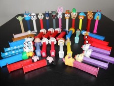 VINTAGE 43 PEZ DISPENSERS ALL WITH FEET--PRICE REDUCED
