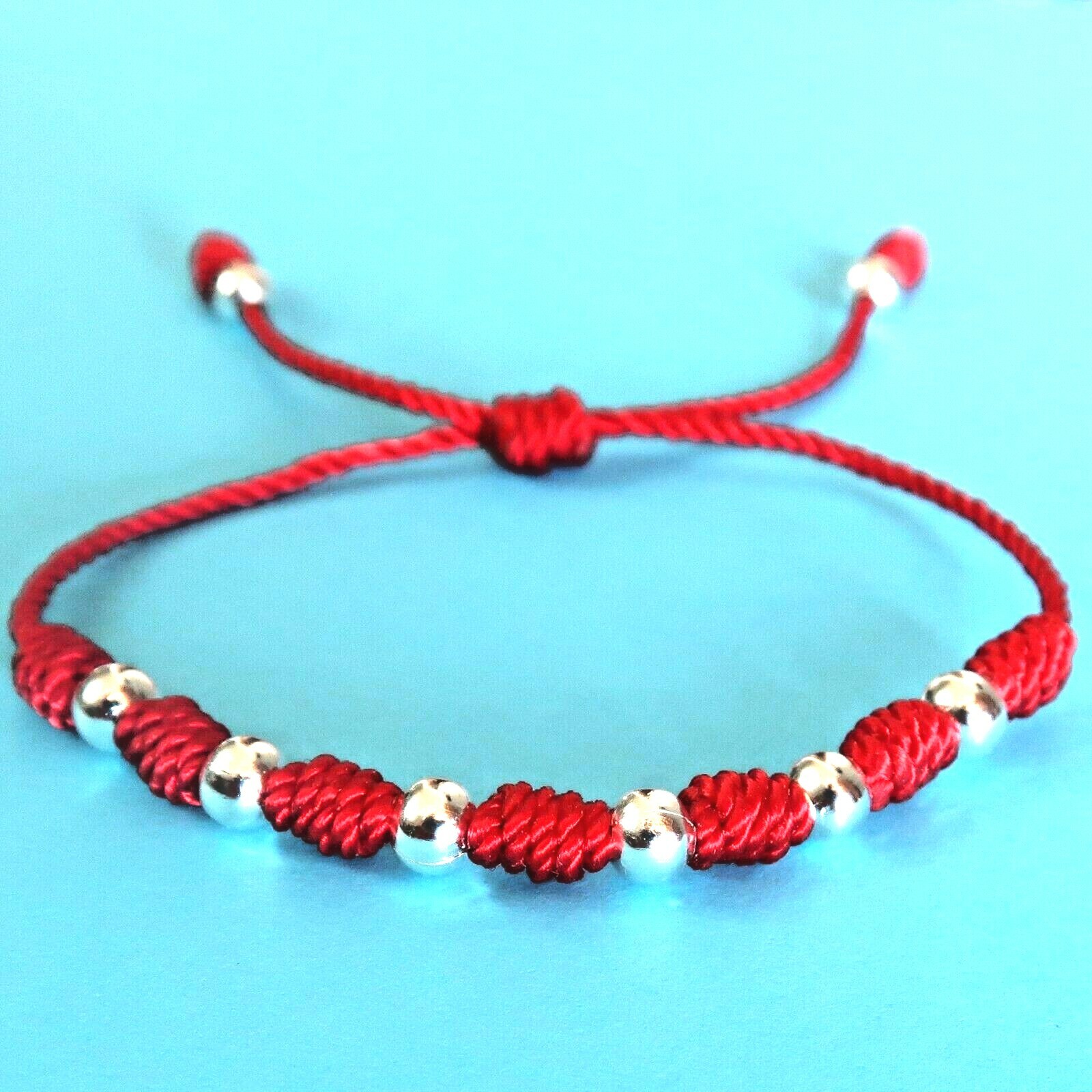 Pulsera roja de 7 nudos de la suerte de hilo cuentas plateadas hombre y mujer eBay