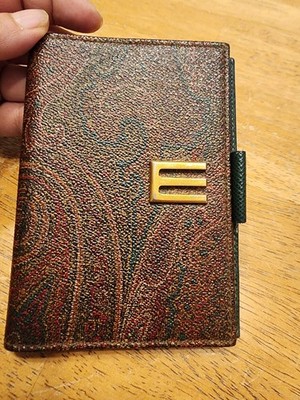 Etro Paisley Agenda Wallet featuring the brand's signature colorful paisley...