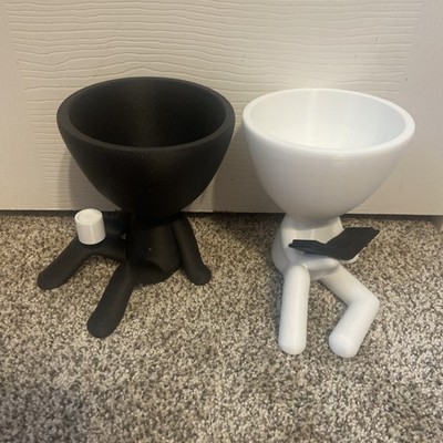 (2) Decorative human-shaped planters - modern coffee and reading 
