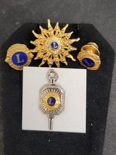 Lote #7 de colgantes/dijes de miembro clave y prendedores de Lions Club International
