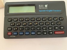 VTG-NEW SII SEIKO TR-2200 SPANISH-ENGLISH TRANSLATOR/ MEMO/AUTO CONVERSION CALC