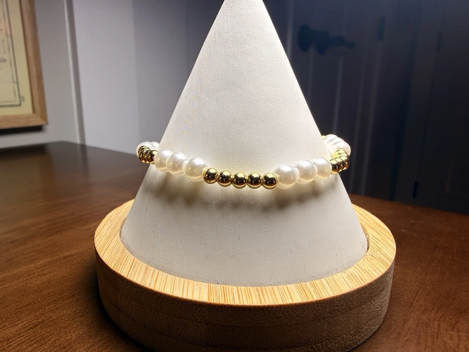 Pulsera Enewton oro y perlas con bolsa para el polvo Foto 2 de 3