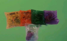 Set Of 4 Taco Bell Jam Phibians + 18m Toy