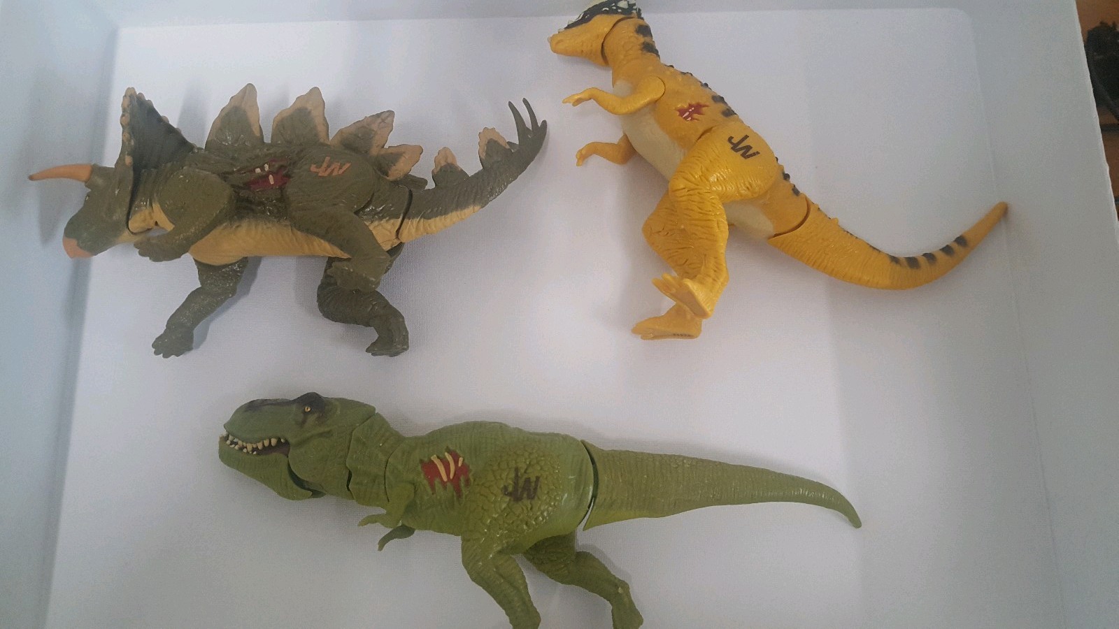JURASSIC WORLD STEGOCERATOPS TYRANNOSAURUS PACHYCEPHALOSAURUS BASHERS AND BITERS JURASSIC WORLD STEGOCERATOPS TYRANNOSAURUS PACHYCEPHALOSAURUS BASHERS AND BITERS