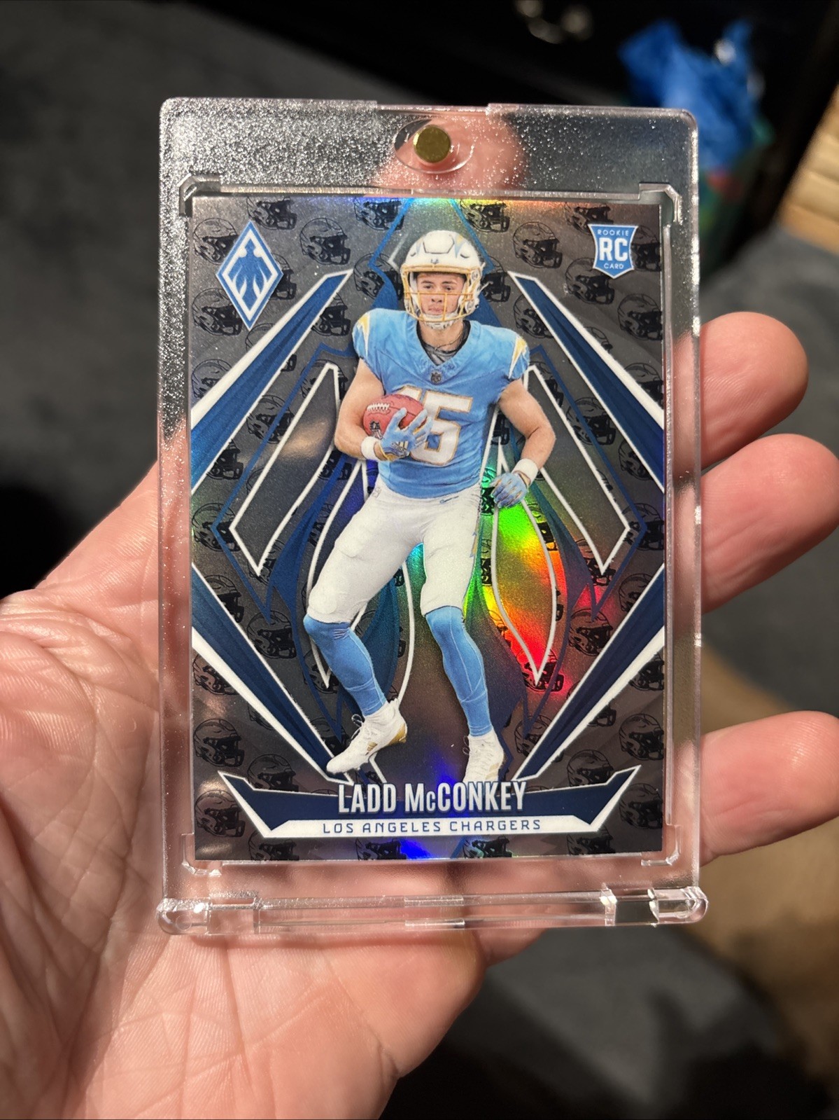 2024 Panini Phoenix - Rookies Ladd McConkey #216 Team Helmet /399 (RC)