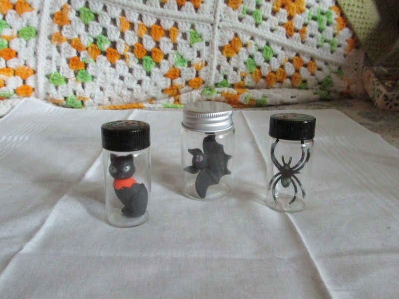cat, bat, and spider w/ glow in the dark parts in bottles, up to 2.75" tall