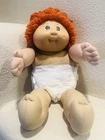 Cabbage Patch Kid 1978/1982 Red Hair, Green Eyes, One dimple, Pony Tail
