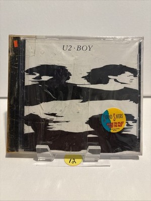 U2 - BOY / FACTORY SEALED CD / 1990 Island. Wrapping Is Beat Up See Pics. 12