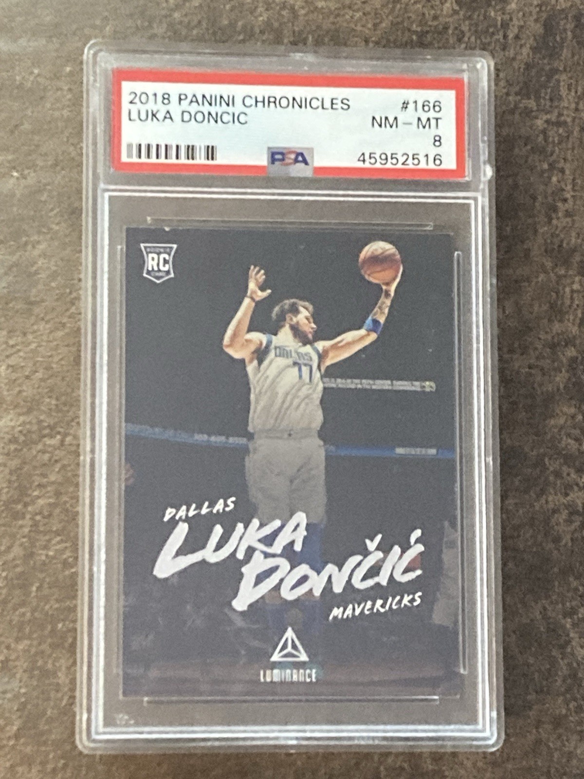 2018-19 Panini Chronicles #166 Luka Doncic Mavericks RC Rookie PSA 8 NM-MT view 1