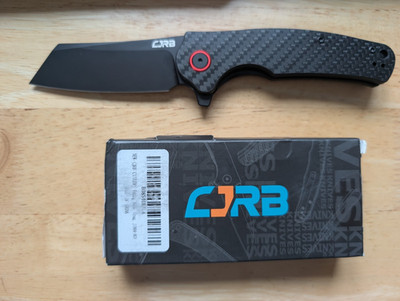 CJRB CUTLERY Carbon Fiber Crag J1904-BCF AR-RPM9 Powder Steel Black PVD
