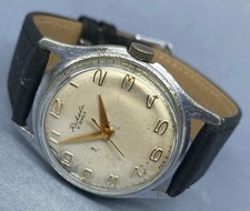 Montre vintage "Raketa" 1960 URSS / Cadran beige / Chiffres arabes / 21 rubis