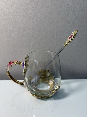 Teetasse aus Glas mit Emaille Blumendekor und passendem Löffel