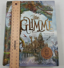 The Glimme by Emily Rodda and Marc McBride Hardcover Book