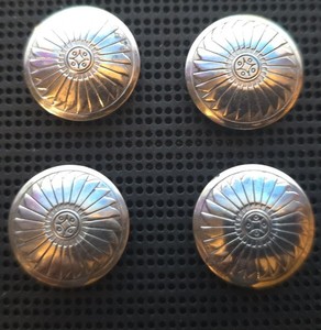 four vintage native American silver button covers