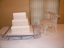 Silver coloured Xmas sleigh wedding cake stand - weddings
