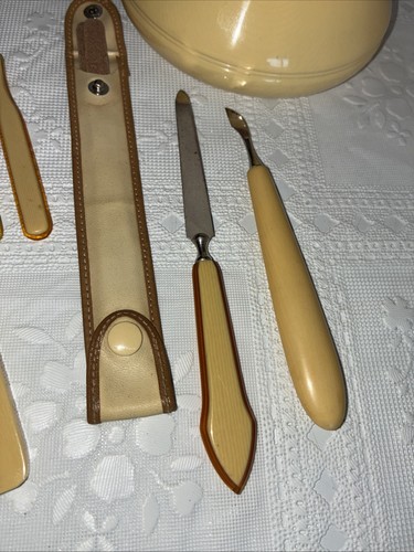 Comò vintage 16 pezzi avorio celluloide bachelite vanità set Marshall Fields usato in ottime condizioni - Foto 3 di 11