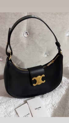 Celine's AVA TRIOMPHE bag cements itself as a new house classic. Slung over the 