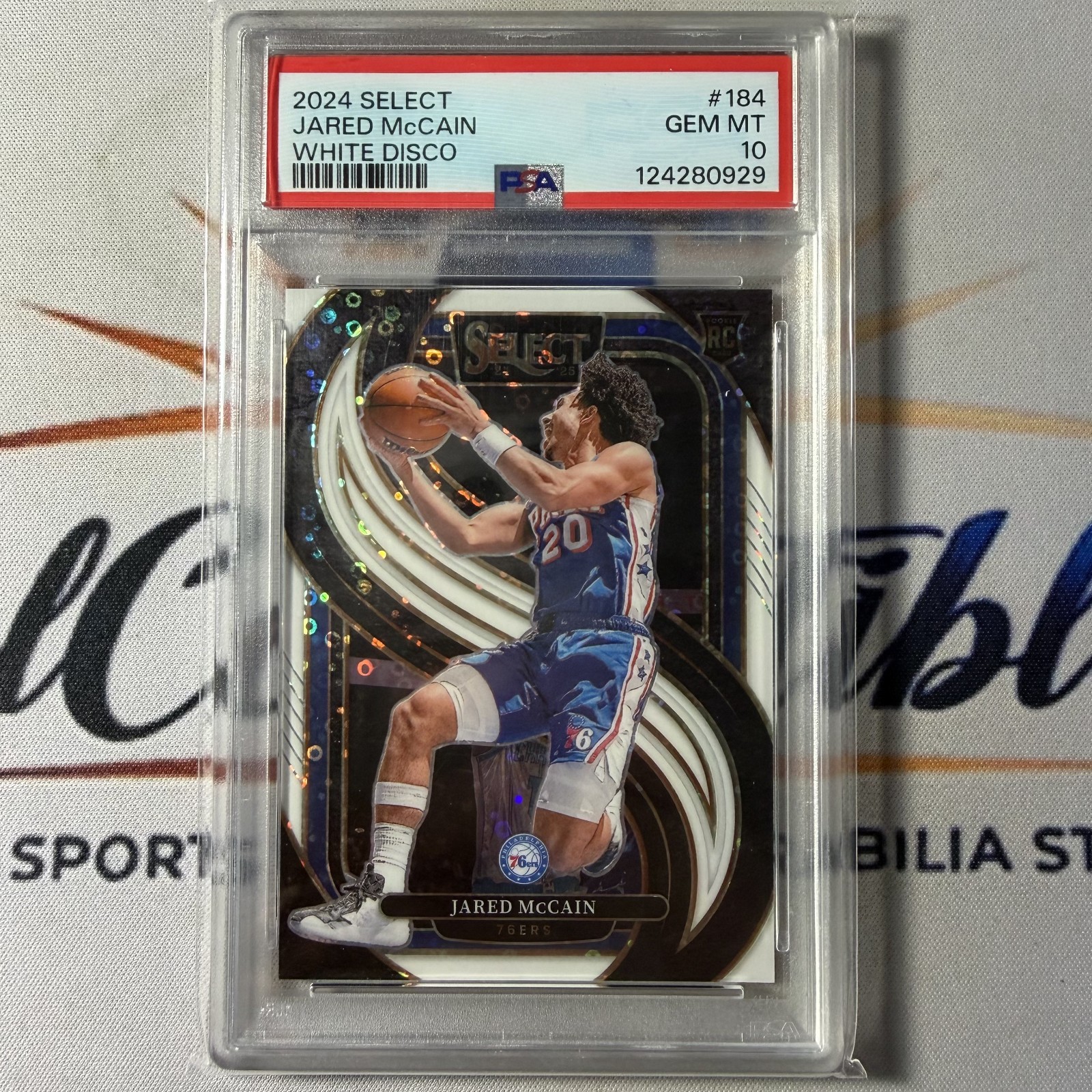 Jared McCain 2024-25 Panini Select #184 White Disco Prizm /75 PSA 10