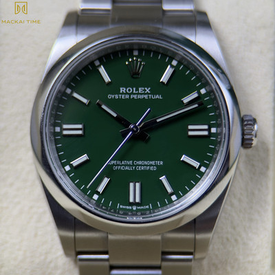 Rolex Oyster Perpetual 126000 Green 22 Oyster Bracelet Silver Bezel Complete Set