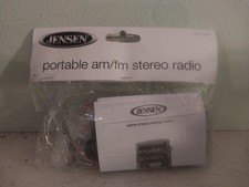 Jensen portable AM/FM stereo radio with headphones - see-thru, great for prison