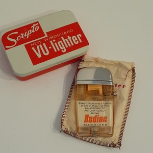 Scripto vu lighter. See thru model. Clear band. Bodine machines. Never used. 