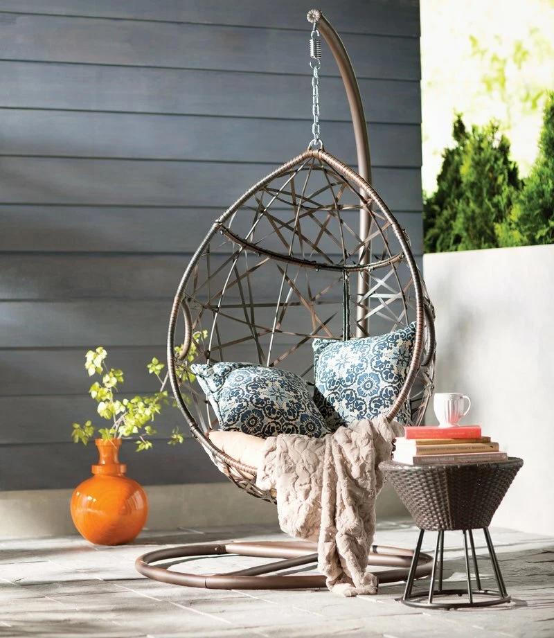 Brown wicker 2024 porch swing