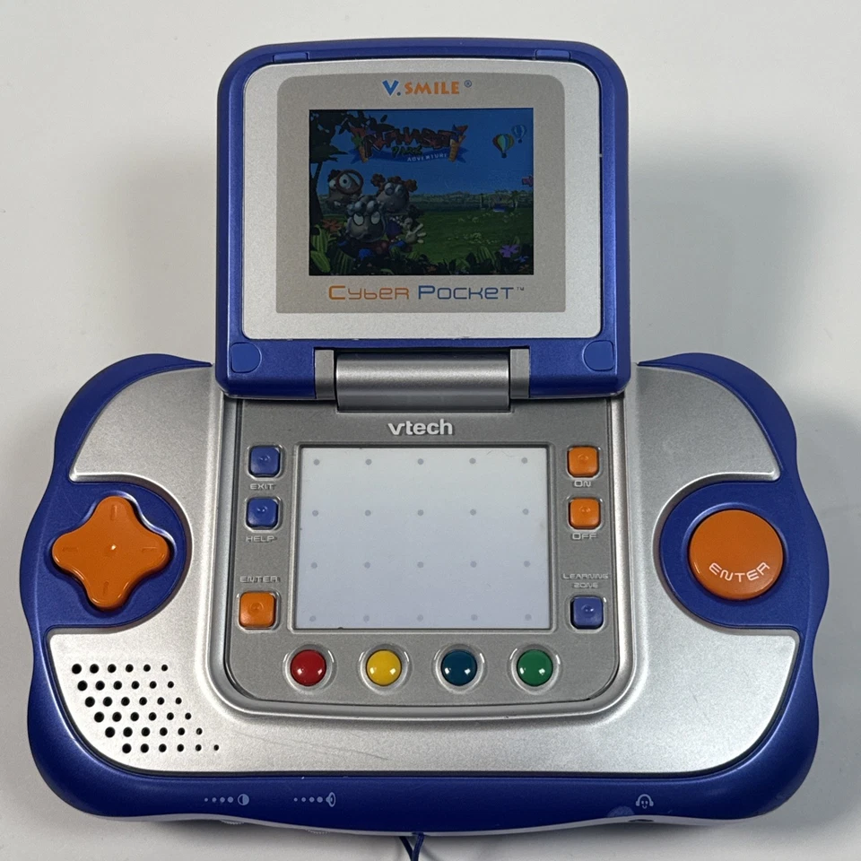 Sistema de aprendizaje VSmile Vtech Cyber Pocket probado incluye 2 juegos y adaptador de CA Foto 2 de 4