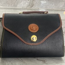 Dooney & Bourke USA Leather purse    with a w...