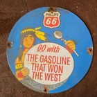 VINTAGE PHILLIPS 66 GIRL WON US GASOLINE OIL GAS PUMP ENAMEL PORCELAIN SIGN