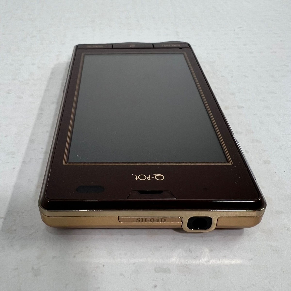 Used] Docomo Sharp SH-04D Q-pot. Bitter Choco Phone Rare